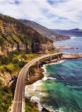 Sea cliff bridge at the edge of steep sandstone cliff on the Grand Pacific drive along pacific coast of New South Wales, Australia.
