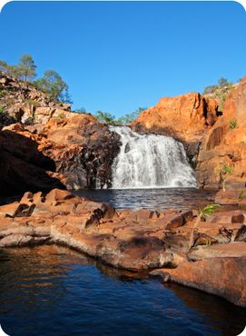 Small waterfall and pool with clear water, Kakadu National Park, Northern Territory, Australia.